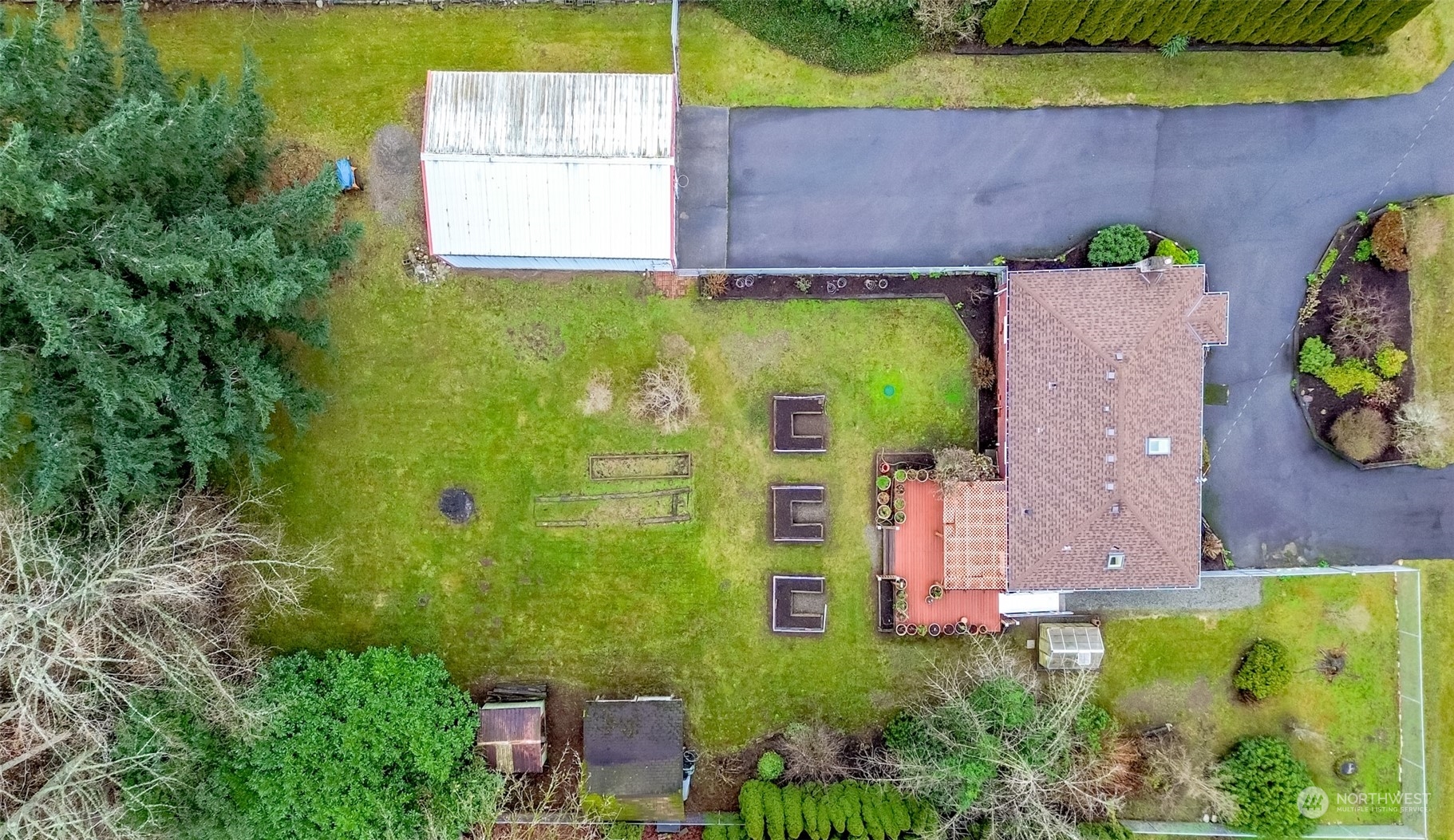 13045 166th Avenue Southeast Renton, WA 98059 - Photo 39 of 40 an aerial view of a house with a yard