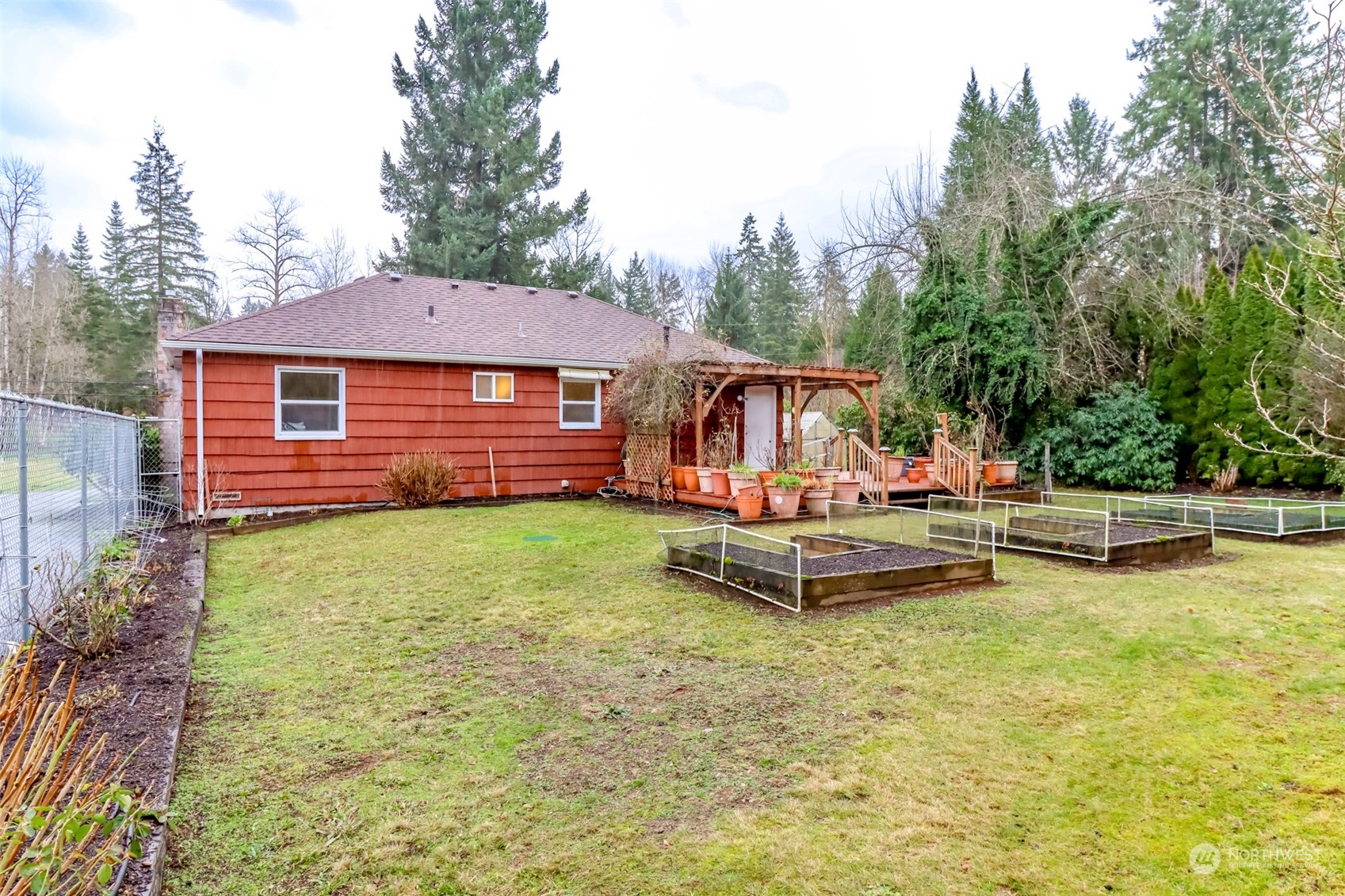 13045 166th Avenue Southeast Renton, WA 98059 - Photo 6 of 40 a view of a swimming pool with chairs