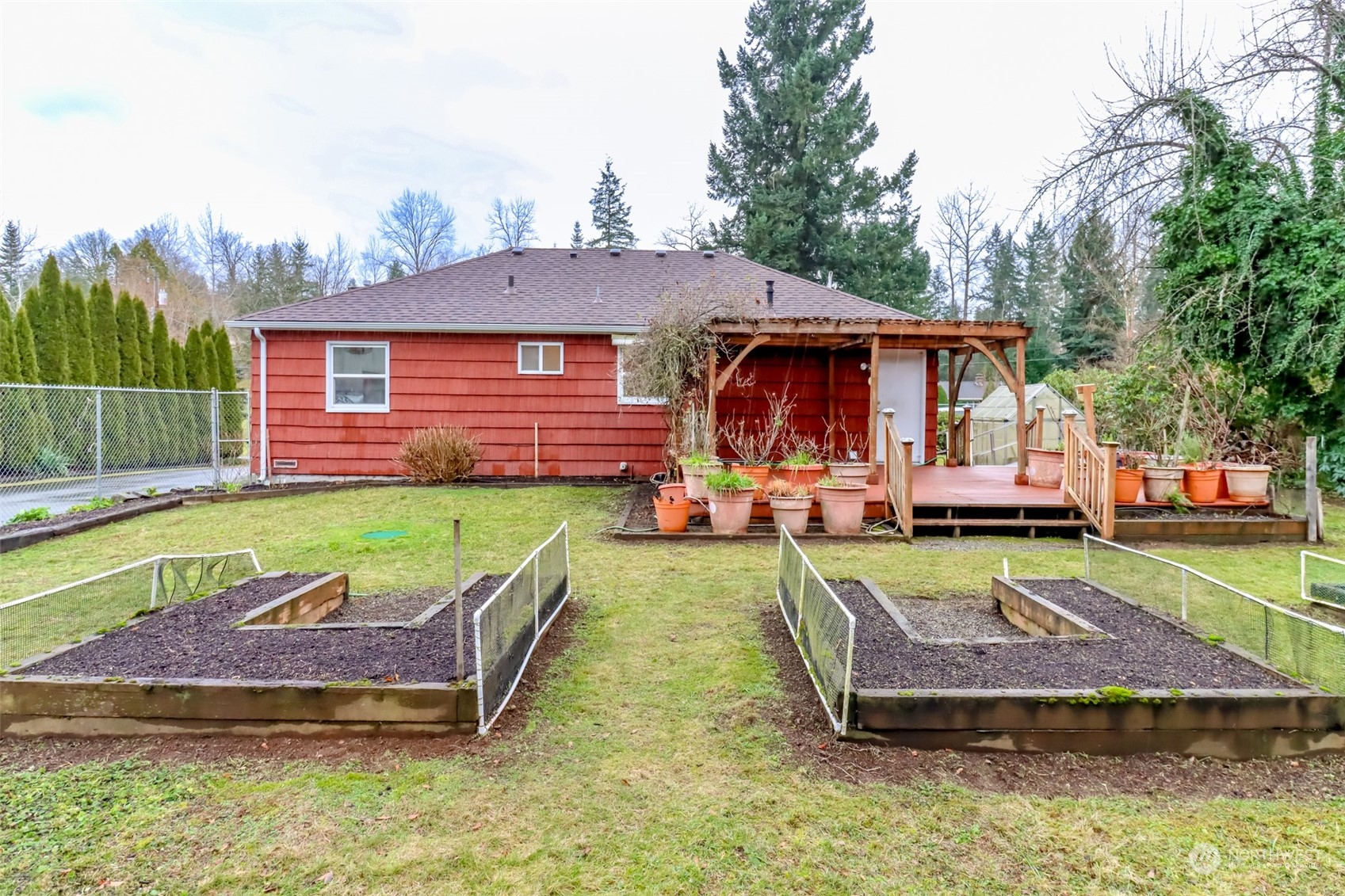 13045 166th Avenue Southeast Renton, WA 98059 - Photo 8 of 40 a view of a house with backyard