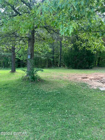 a view of outdoor space with a garden
