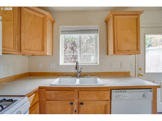 4000 Northeast 109th Avenue, Unit 53 Vancouver, WA 98682 - Photo 13 of 27 a kitchen with a sink and cabinets