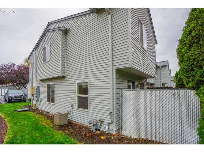4000 Northeast 109th Avenue, Unit 53 Vancouver, WA 98682 - Photo 25 of 27 a view of a white house with a yard and stairs