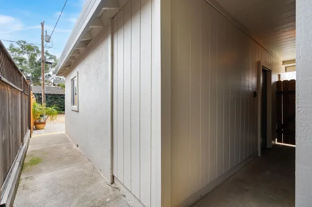 a view of a livingroom with furniture and lounge chair
