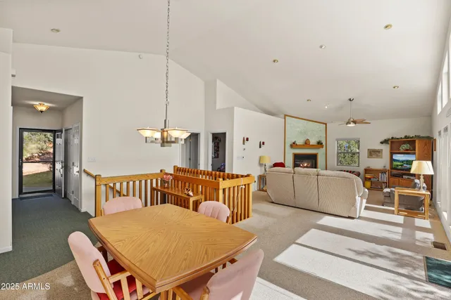 a bedroom with furniture and a rug