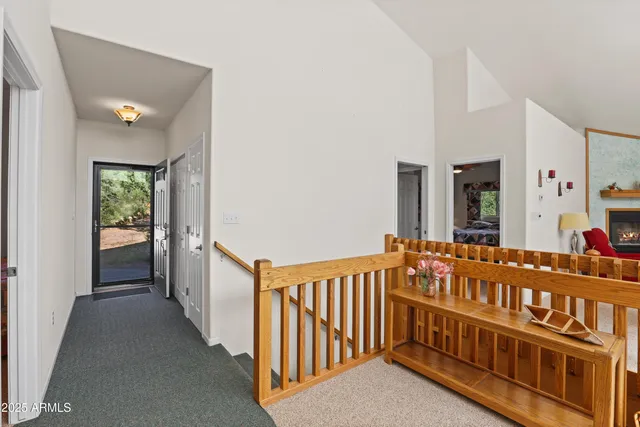 a view of a porch with wooden floor and windows