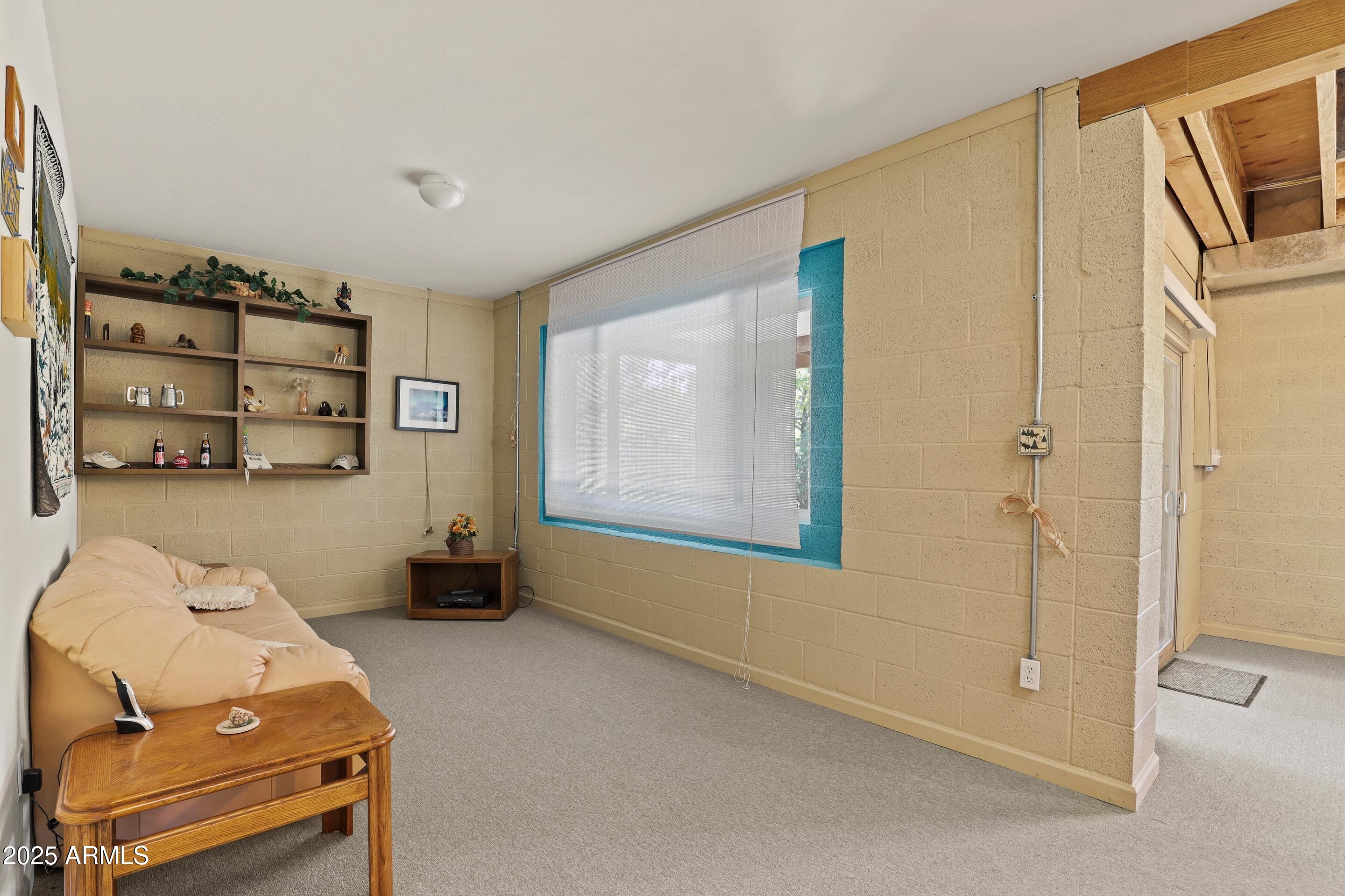 989 Verde Road Payson, AZ 85541 - Photo 25 of 44 a bedroom with a bed and furniture