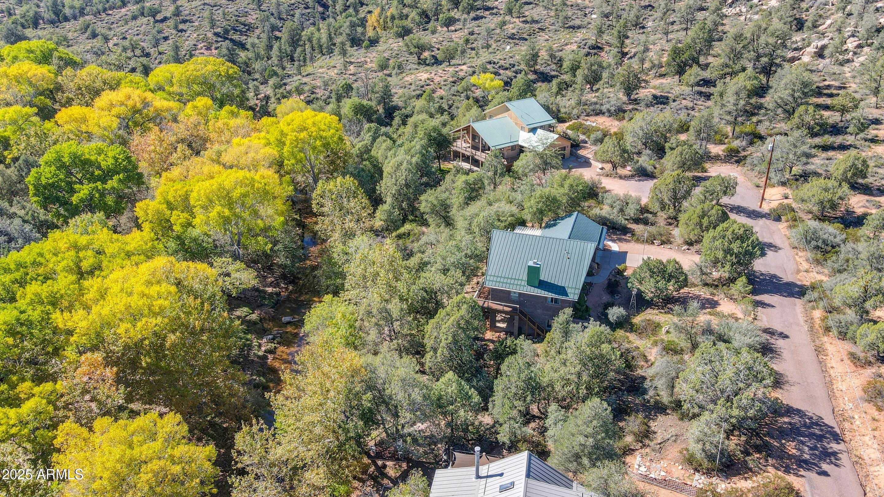 989 Verde Road Payson, AZ 85541 - Photo 42 of 44 an aerial view of residential house with swimming pool and green space