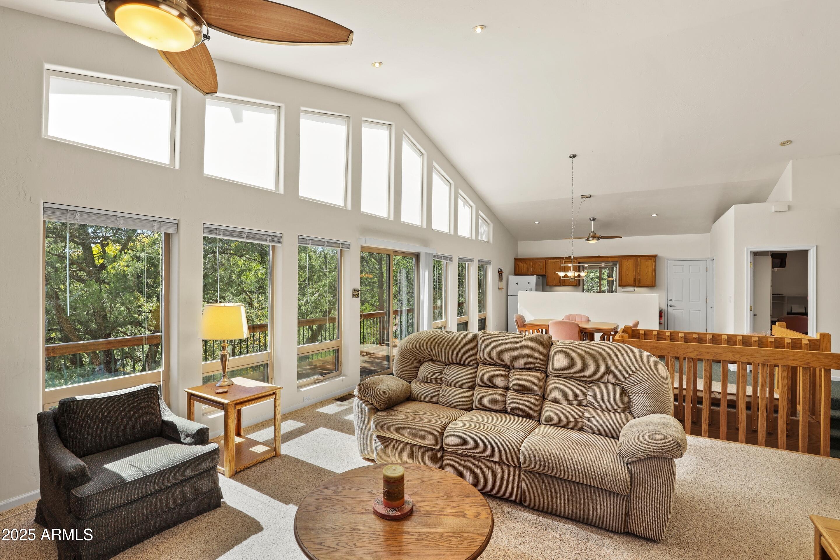 989 Verde Road Payson, AZ 85541 - Photo 10 of 44 a living room with furniture and a large window