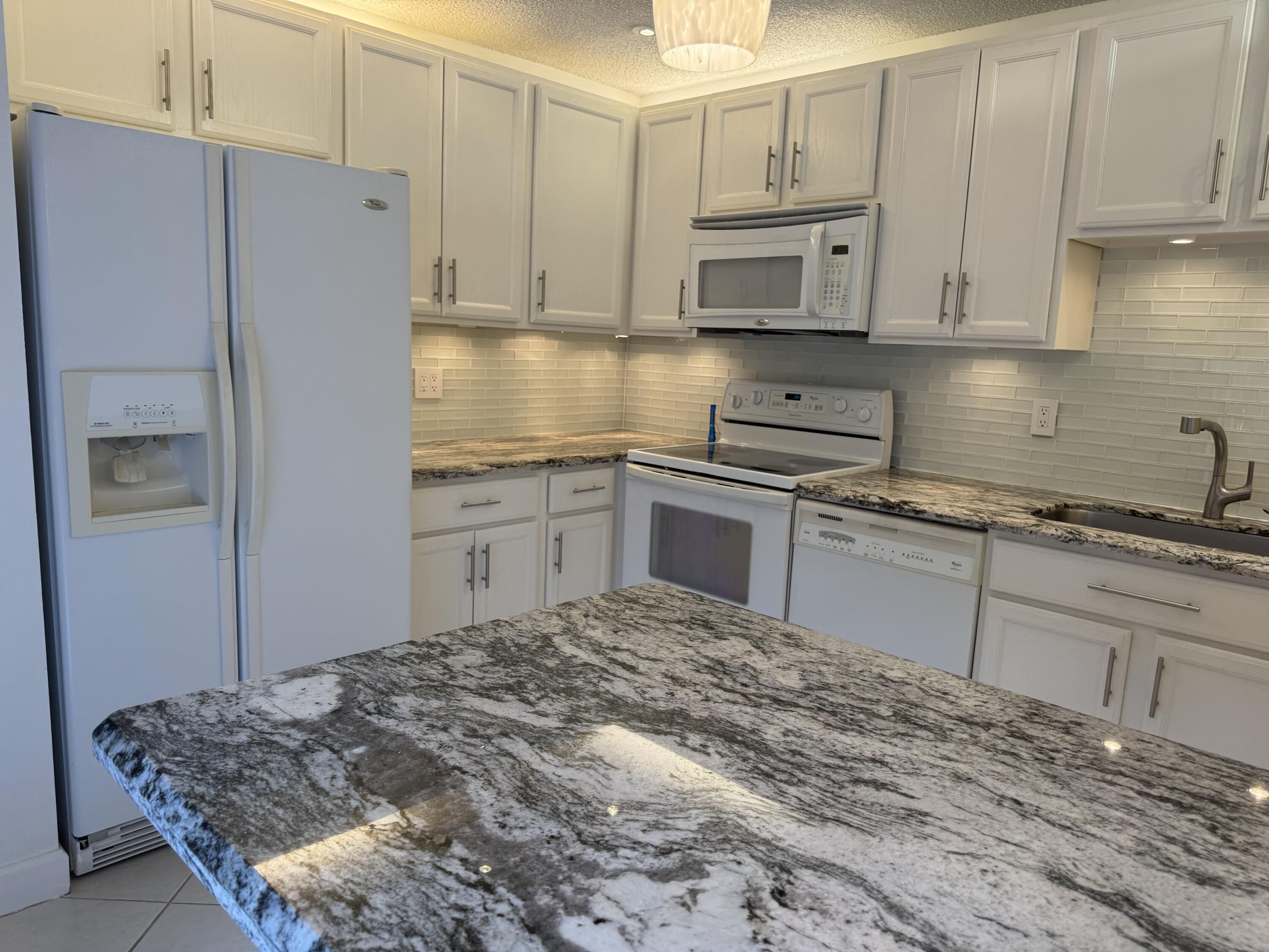 9070 Southwest 22nd Street, Unit D Boca Raton, FL 33428 - Photo 7 of 17 KITCHEN