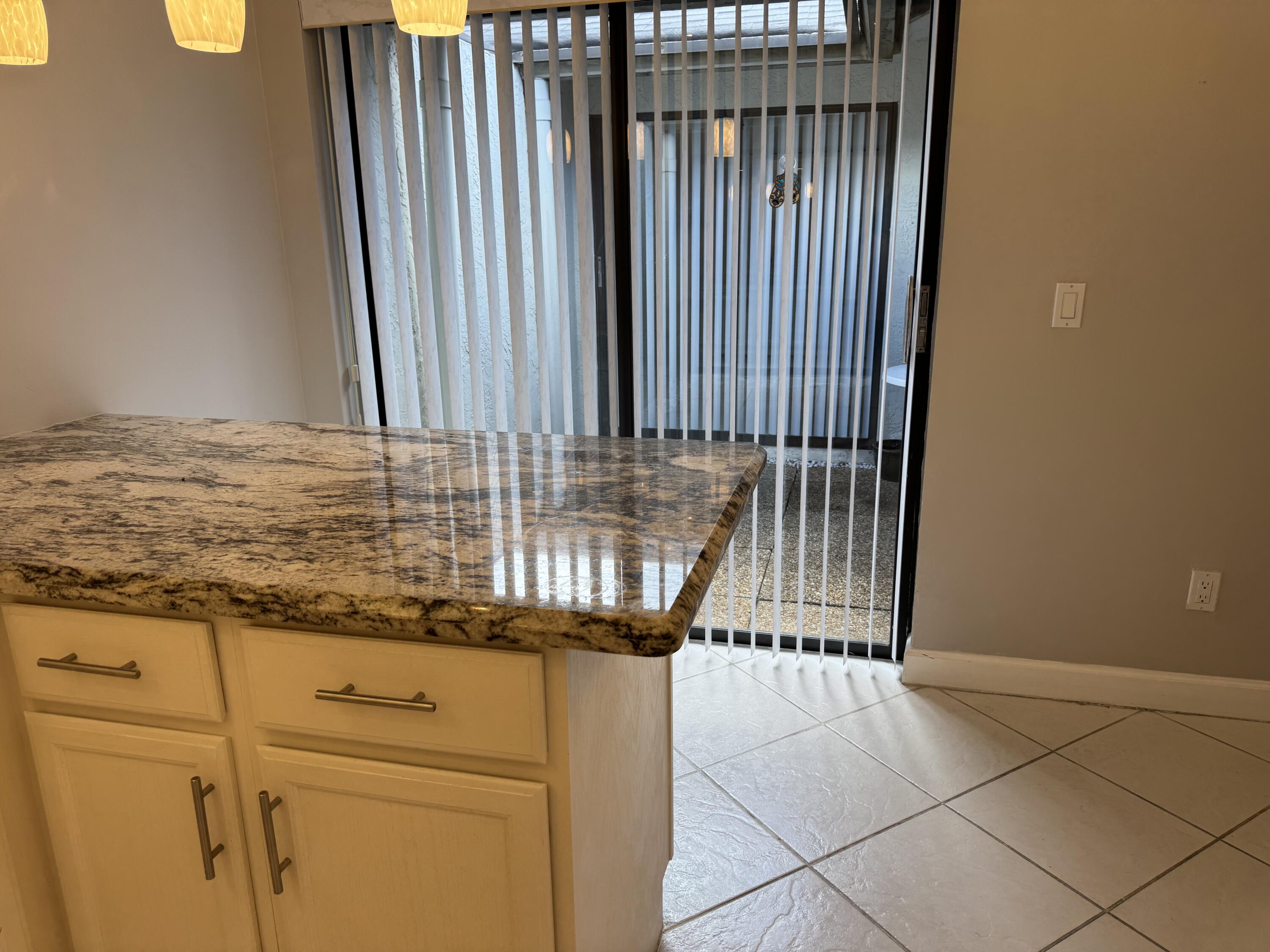 9070 Southwest 22nd Street, Unit D Boca Raton, FL 33428 - Photo 8 of 17 KITCHEN
