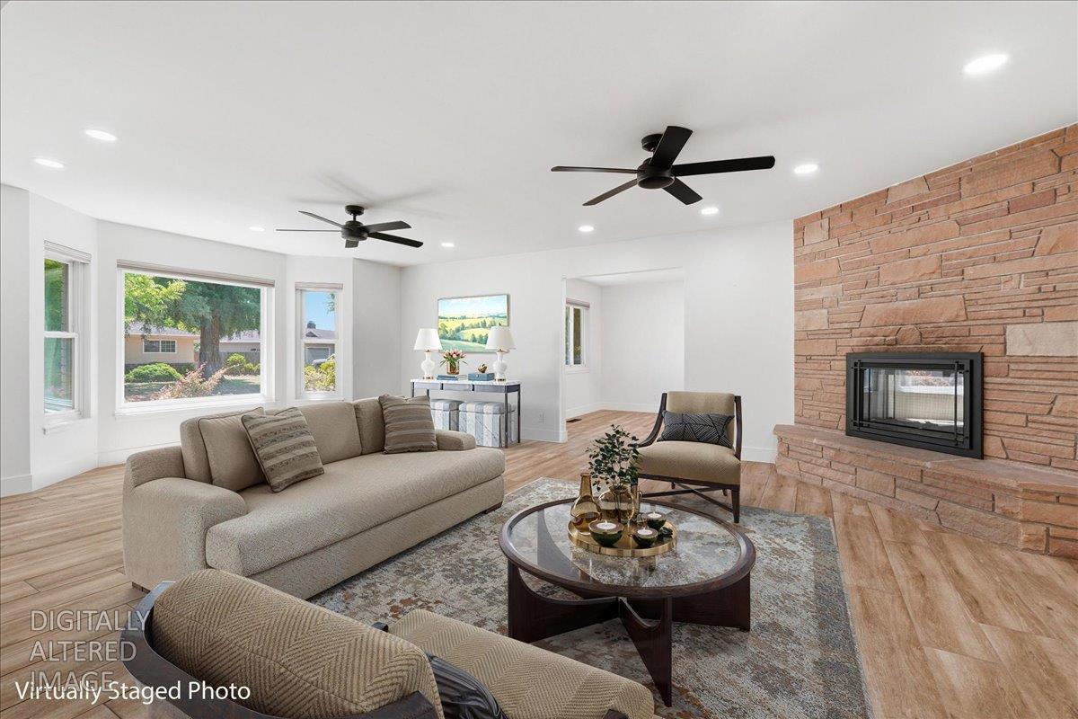 4849 Alexon Way Carmichael, CA 95608 - Photo 5 of 50 a living room with furniture and a fireplace