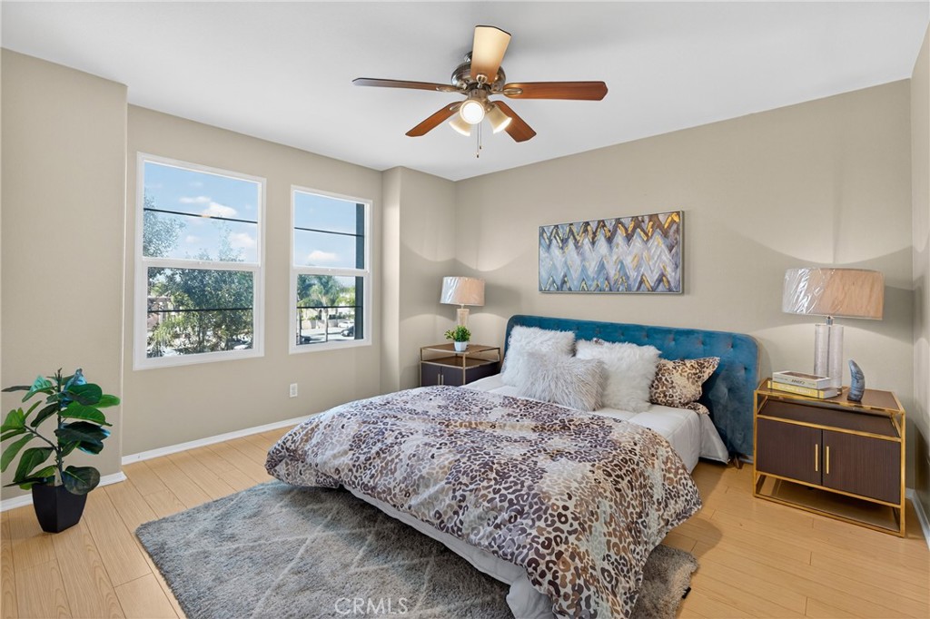 942 South 4th Street Montebello, CA 90640 - Photo 11 of 20 a bedroom with a bed and a potted plant