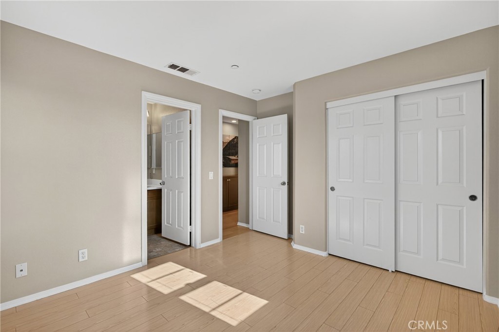 942 South 4th Street Montebello, CA 90640 - Photo 16 of 20 a view of an empty room with wooden floor
