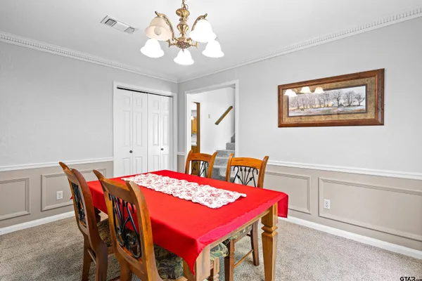 a view of a dining room with furniture