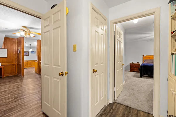 a view of a bedroom from a hallway