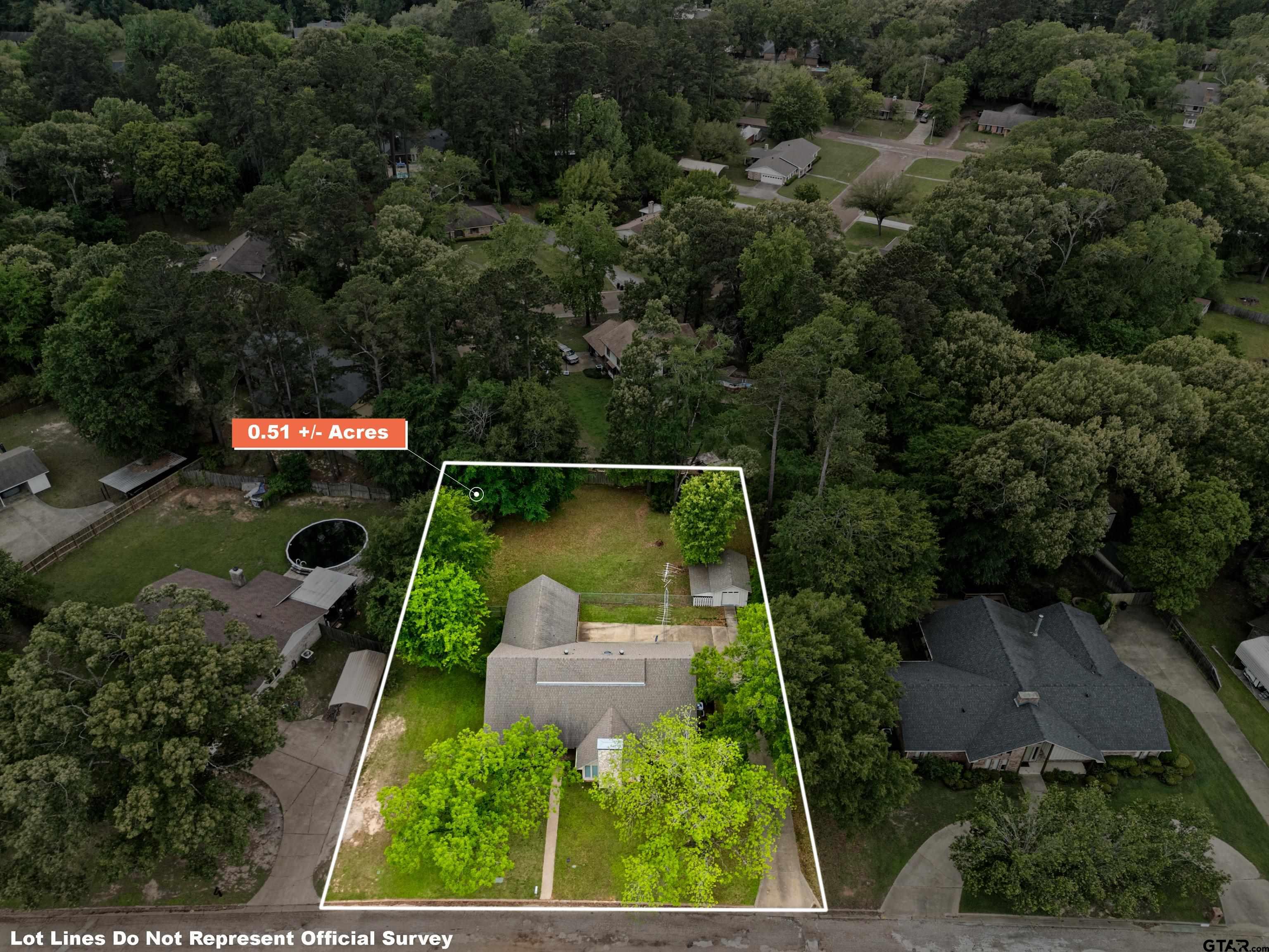 1810 Azalea Street Gilmer, TX 75644 - Photo 5 of 47 an aerial view of a house with pool outdoor seating and yard