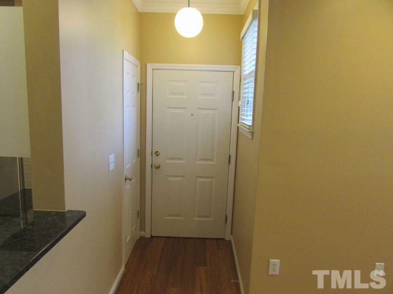 710 North Person Street, Unit 207 Raleigh, NC 27604 - Photo 2 of 12 a bathroom with a sink and a mirror