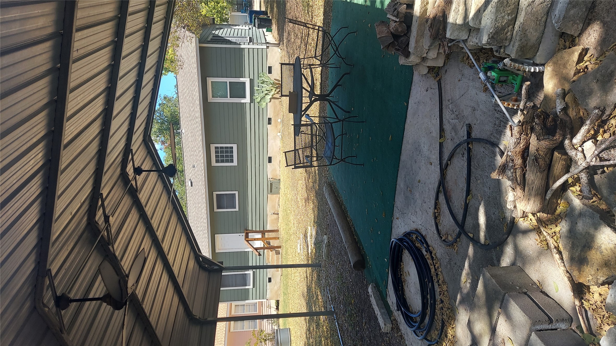 1411 Ruth Avenue Austin, TX 78757 - Photo 8 of 26 NICE LARGE COVERED AREA FOR CAR OR OUTDOOR ACTIVITIES