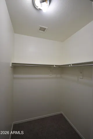 a view of small space with racks on the wall