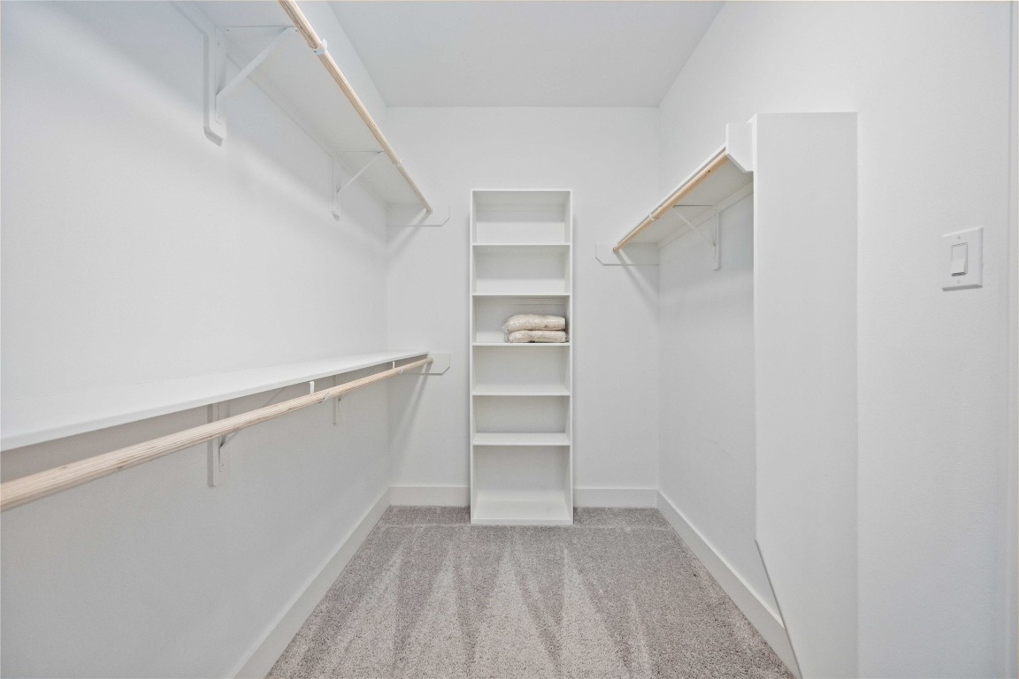 1324 West Pierce Street Houston, TX 77019 - Photo 19 of 26 a view of an empty walk in closet