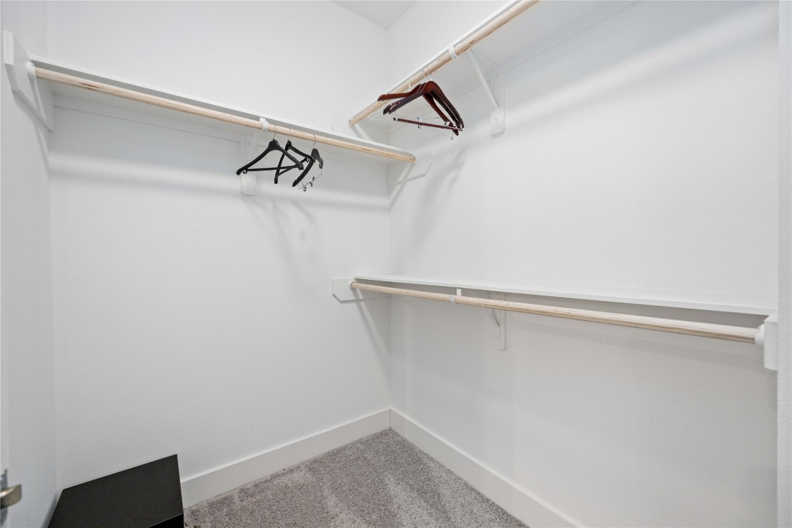 1324 West Pierce Street Houston, TX 77019 - Photo 20 of 26 a view of a room with racks on the wall