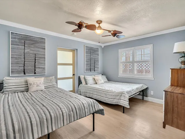 a view of a two chairs in the balcony