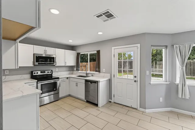 an empty room with windows