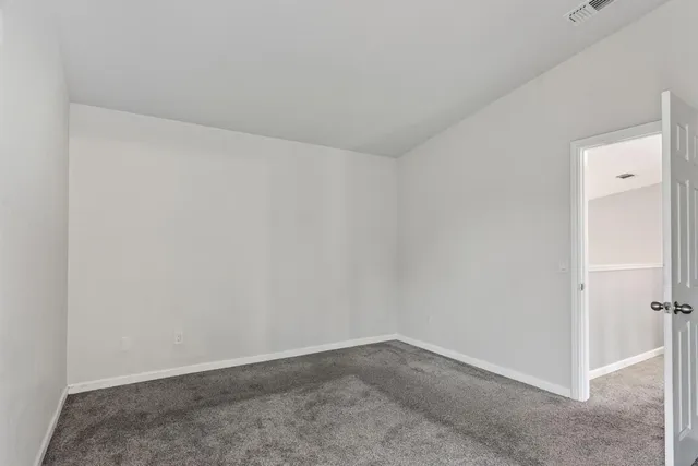 a view of a glass door and the balcony