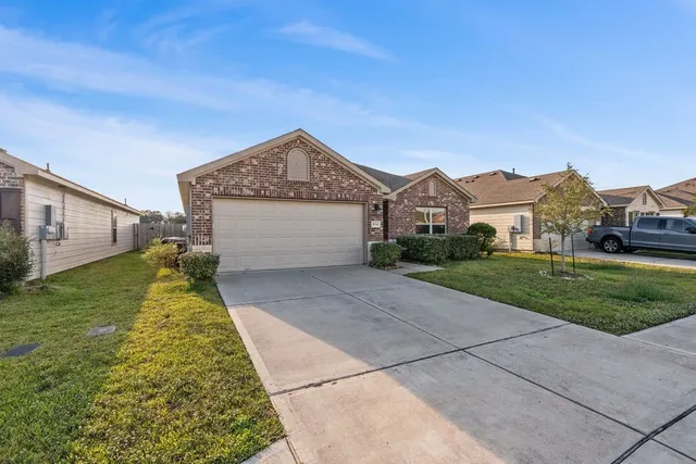a view of an house with a garden