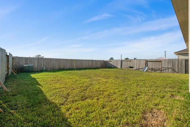 a bathroom with a sink and a yard