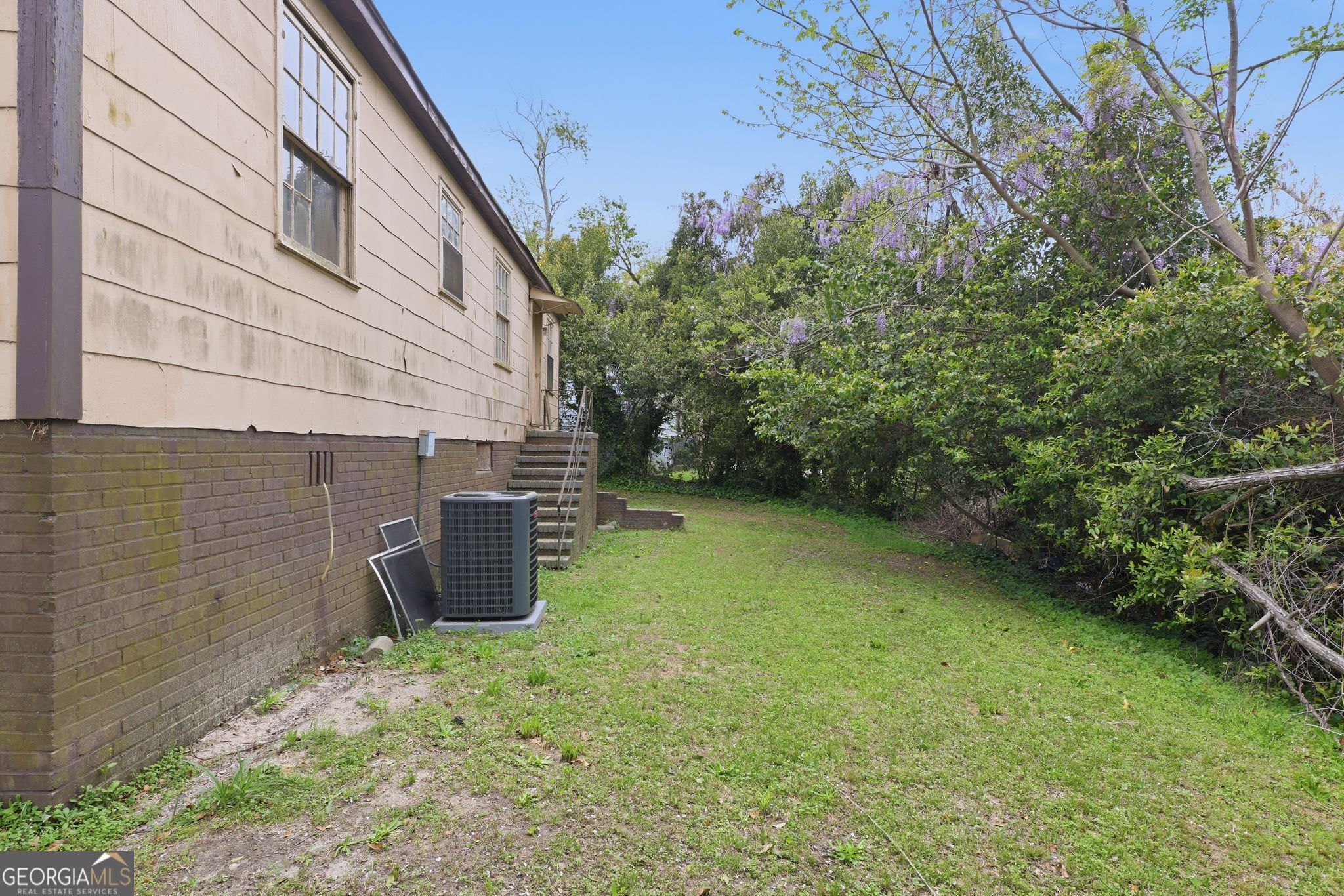 2413 Ruby Drive Augusta, GA 30906 - Photo 30 of 32 a backyard of a house with lots of green space