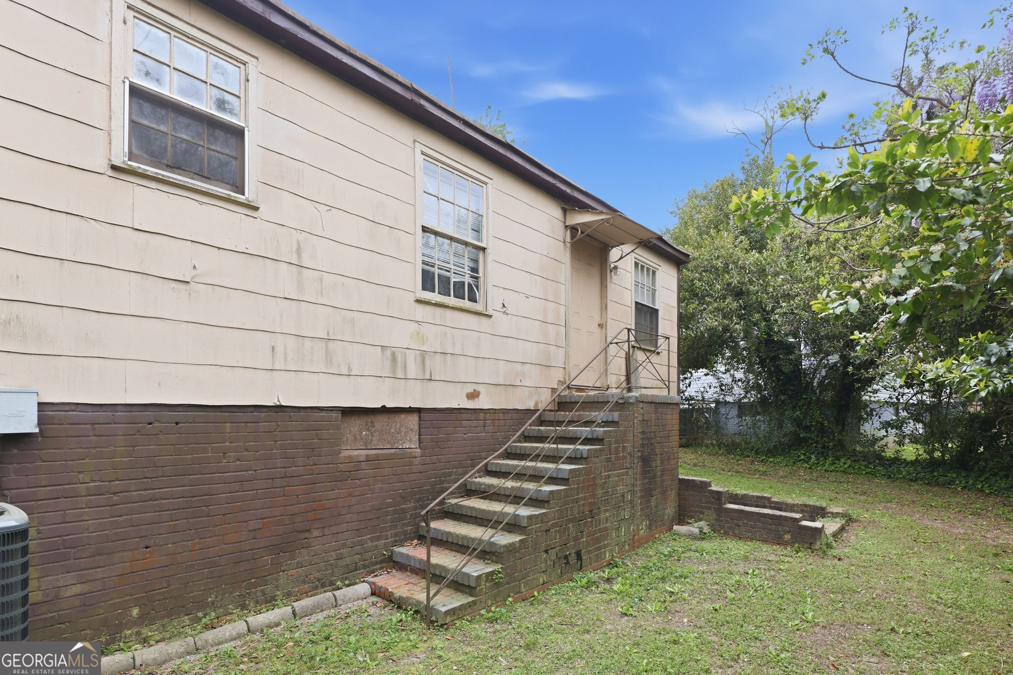 2413 Ruby Drive Augusta, GA 30906 - Photo 6 of 32 a backyard of a house with lots of green space