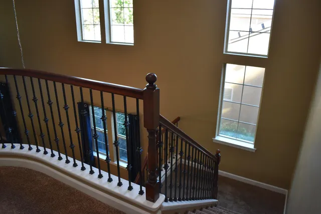 a view of a porch with wooden floor