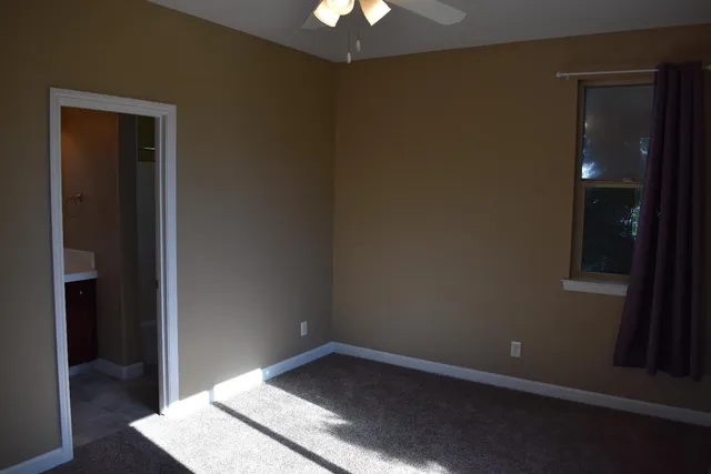 an empty room with a hallway