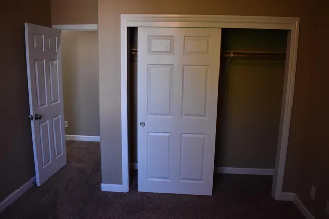 an empty room with closet