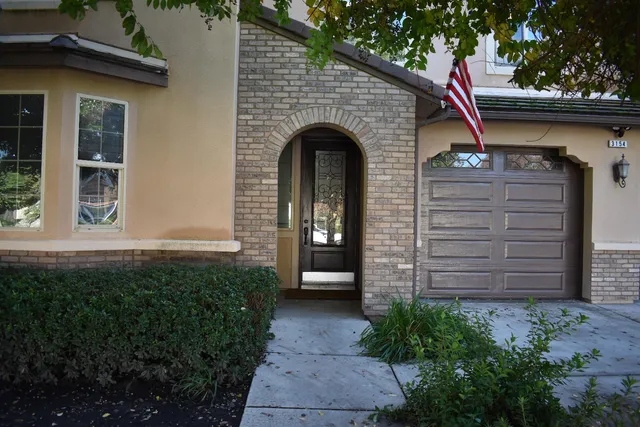 a view of entrance gate of a house