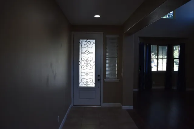 an empty room with windows