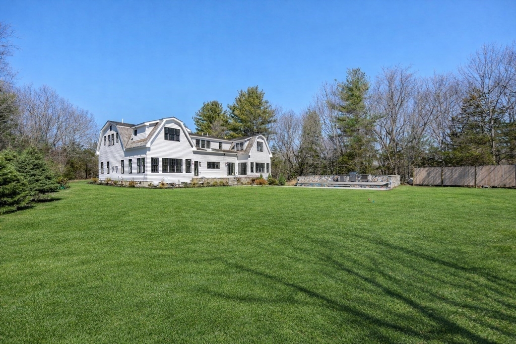 10 Hitching Post Lane Weston, MA 02493 - Photo 42 of 42 a view of a house with a big yard