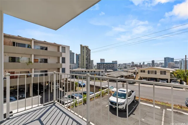a view of a balcony with city view