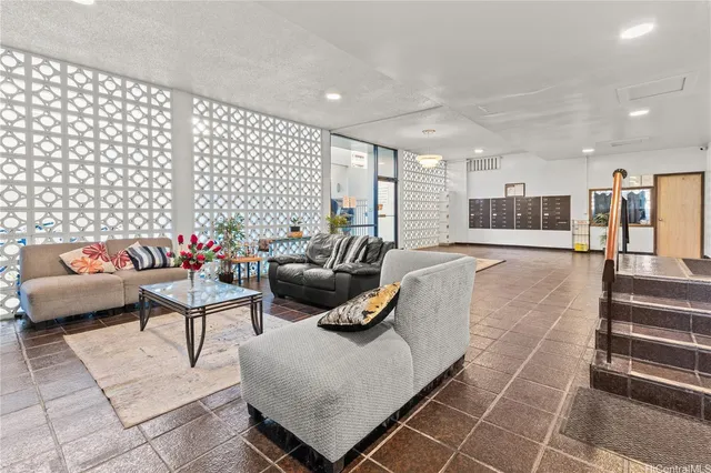 a living room with furniture and a couch