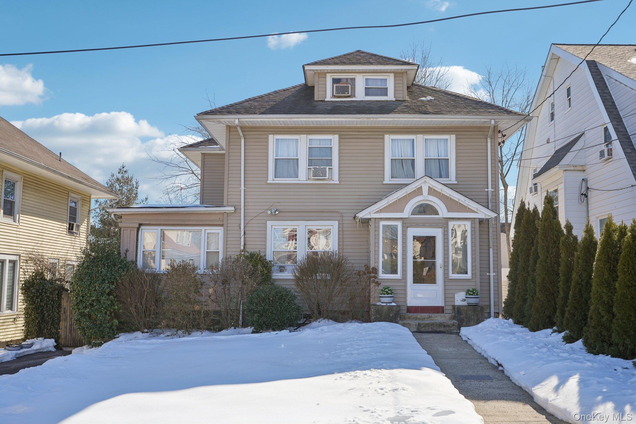 30 Ferdinand Place New Rochelle, NY 10801 - Photo 1 of 46 a front view of a house with a yard