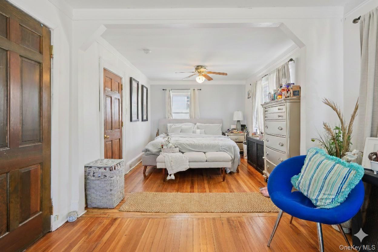 30 Ferdinand Place New Rochelle, NY 10801 - Photo 15 of 46 a living room with furniture and a wooden floor