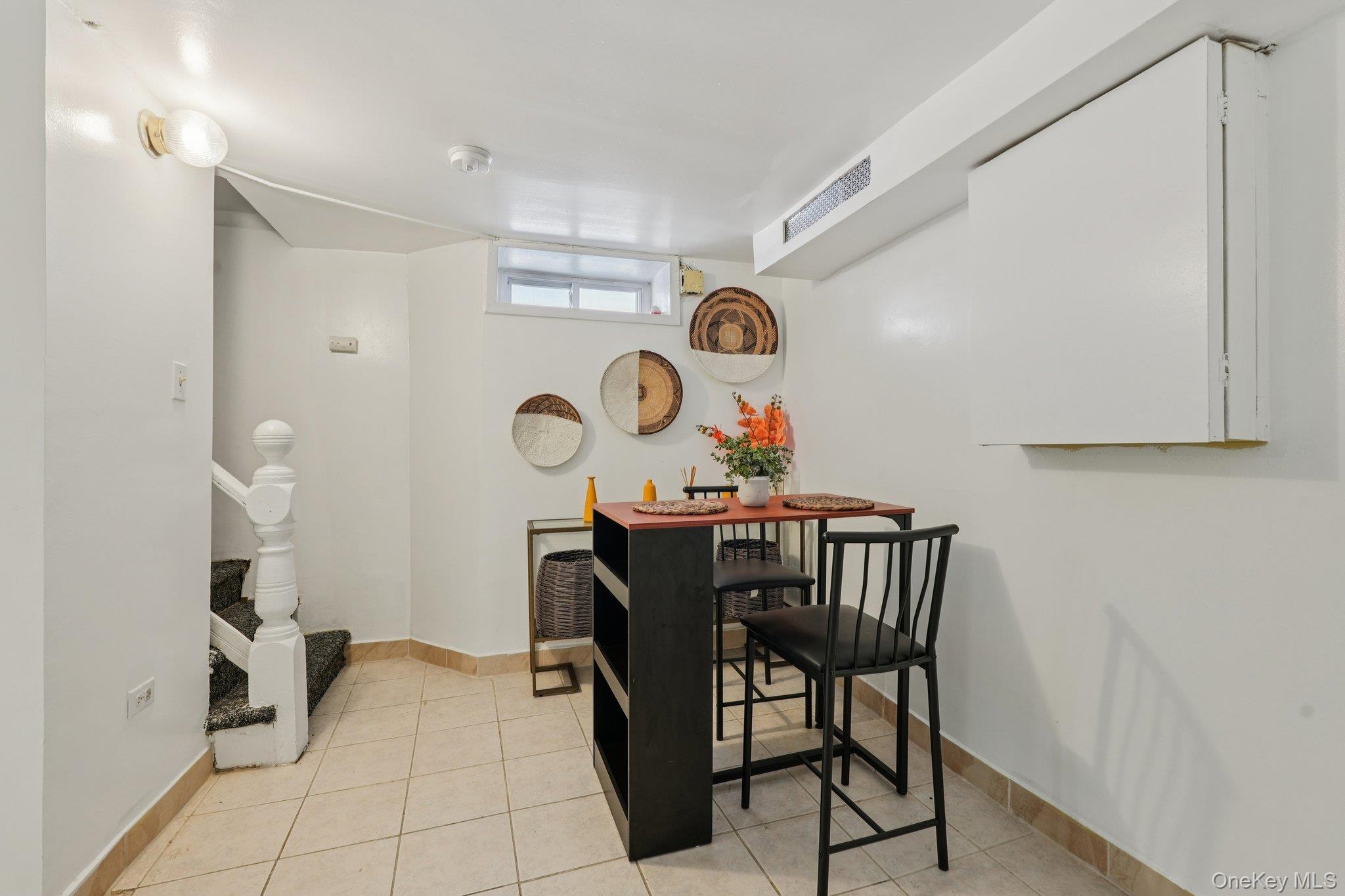 30 Ferdinand Place New Rochelle, NY 10801 - Photo 33 of 46 a view of a dining room with furniture and wooden floor
