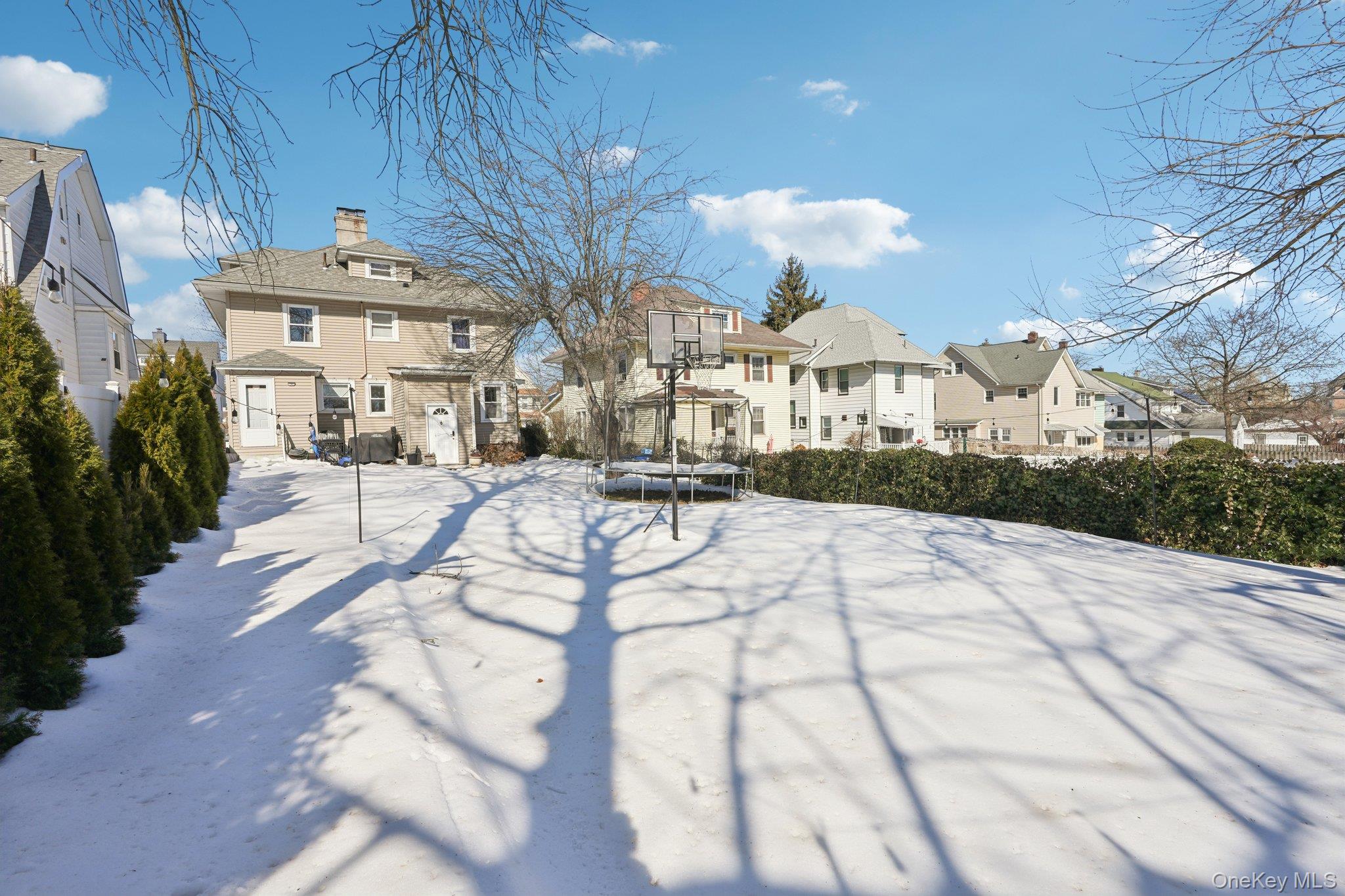 30 Ferdinand Place New Rochelle, NY 10801 - Photo 37 of 46 a view of a white building with many windows