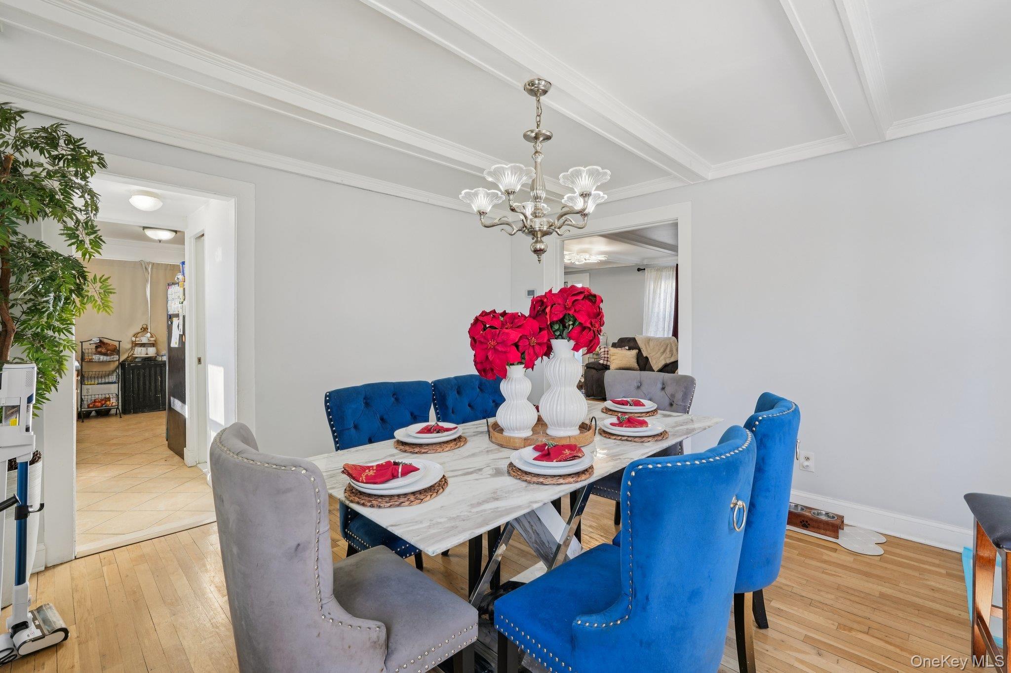 30 Ferdinand Place New Rochelle, NY 10801 - Photo 7 of 46 a view of a dining room with furniture and chandelier