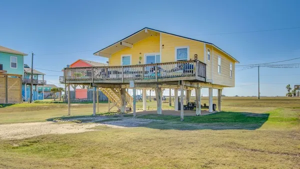 a view of a house with a swimming pool