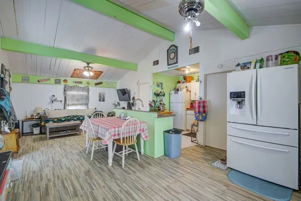 a bedroom with a bed and a cabinets