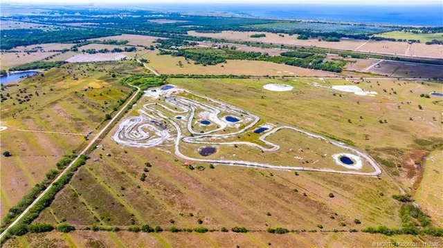 a bathroom with a blue swimming pool