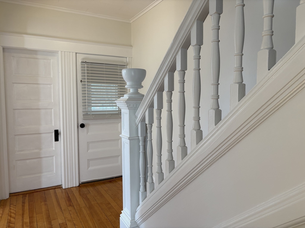 57 Coburn Avenue, Unit 2 Worcester, MA 01604 - Photo 17 of 42 a view of staircase with wooden floor and staircase