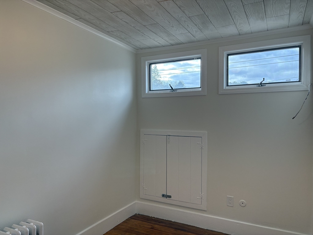 57 Coburn Avenue, Unit 2 Worcester, MA 01604 - Photo 27 of 42 a view of empty room with windows